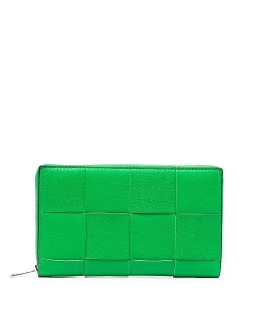 Portefeuille zippé en cuir Intrecciato Bottega Veneta pour homme en coloris Green