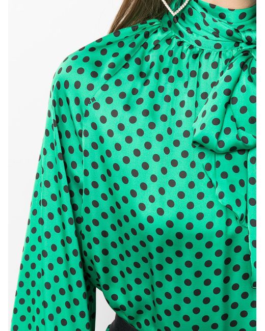 green spotty blouse