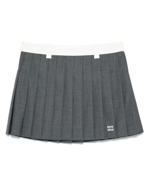 Falda corta plisada Miu Miu de color Gray