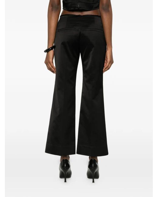 Totême Black Kick Flare Trousers