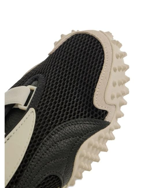 Sneakers Con Inserti di PUMA in Black