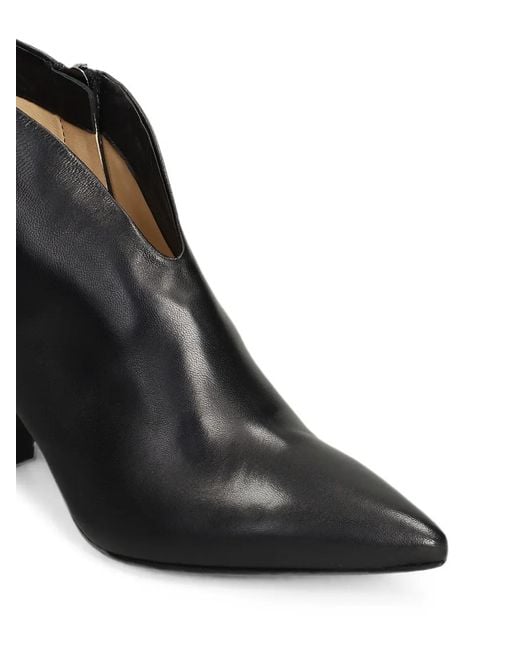 The Seller Black Pointed-Toe V-Cut Boots