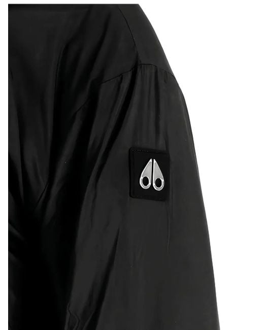 Moose Knuckles Black Cropped Faux Fur Jacket With Plush Hood And Zippered Pockets