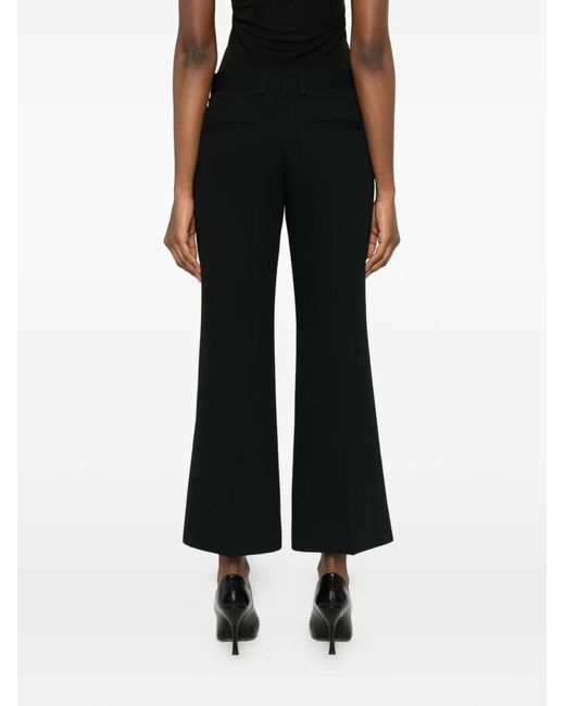 Totême  Black Kick Flared Trousers
