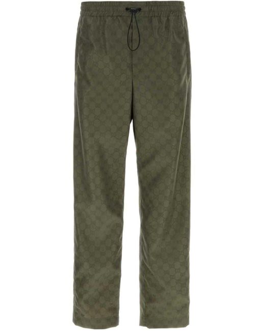 Gucci Green All-Over Logo-Print Trousers for men