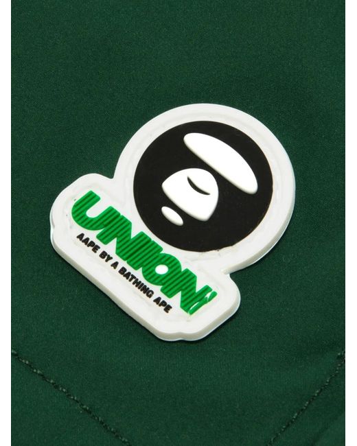 Aape By A Bathing Ape Green Moonface Track Shorts for men