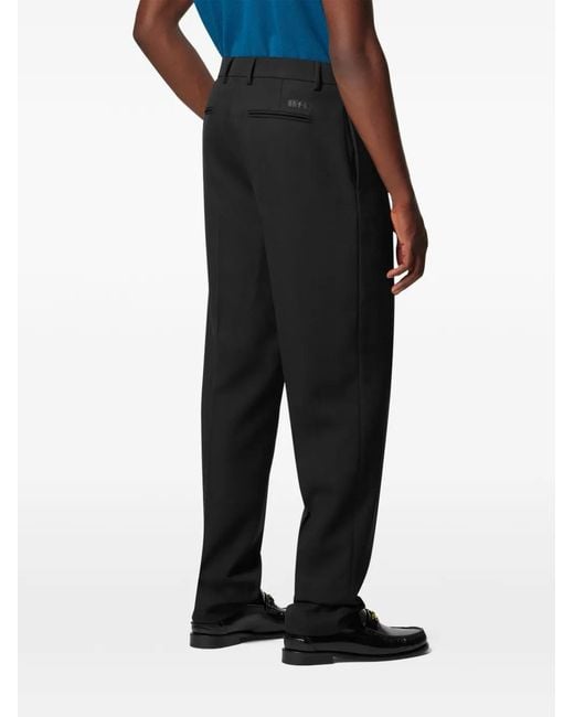 Versace Black Wool Tapered Formal Trousers for men