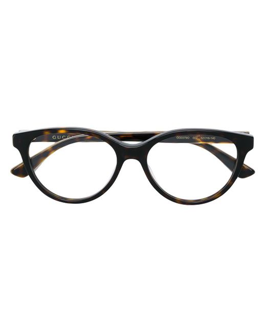 Tortoiseshell-effect square glasses Gucci en coloris Brown