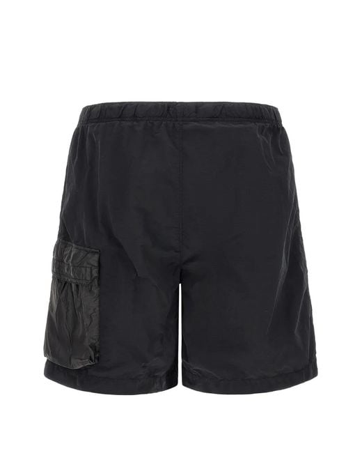 C P Company Black Rente Wrinkle Nylon Swim Shorts With Leg Pocket With Lens Detail.<Br for men