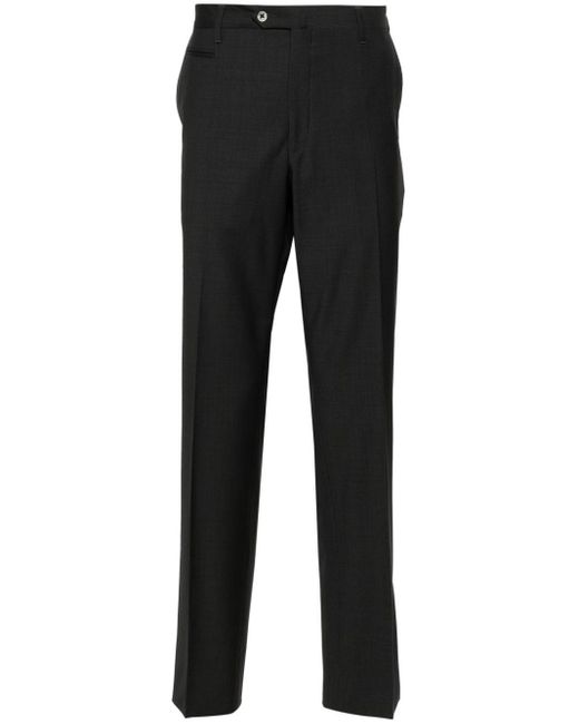 Mid-rise tailored wool trousers di Corneliani in Black da Uomo