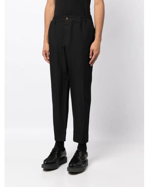 Pantalones ajustados con motivo chevron COMME DES GARÇON BLACK de color Black