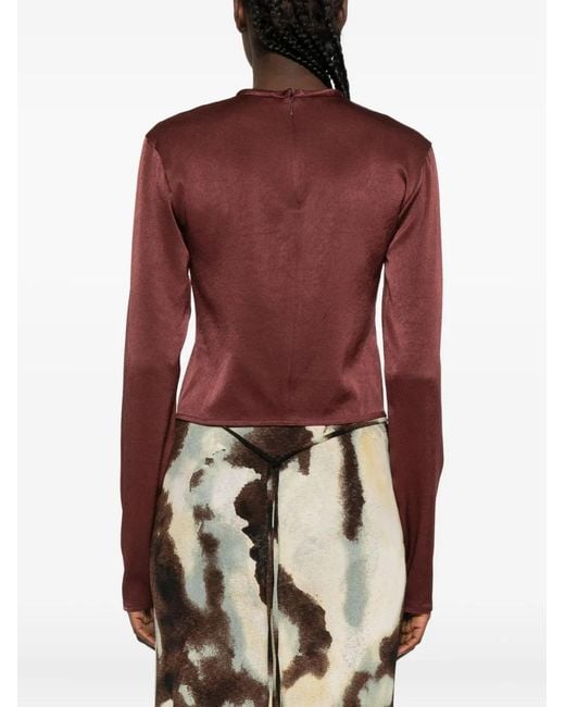 Top con dobladillo asimétrico Nanushka de color Purple