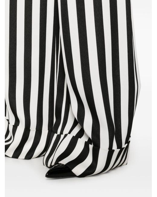 Pantalon palazzo à rayures Moschino en coloris White