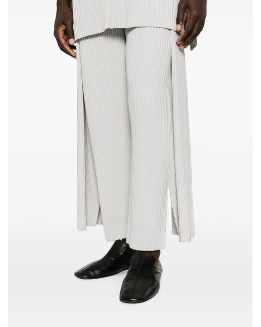 Homme Plissé Issey Miyake White Motion Blur Pleated Trousers for men