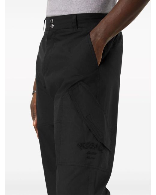 Pantalones de vestir rectos Versace de hombre de color Black