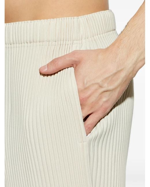 Homme Plissé Issey Miyake White Pleated Slim Trousers for men