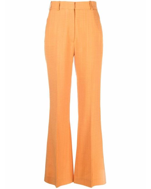 Sandro High-rise Flared Trousers in Orange - Lyst