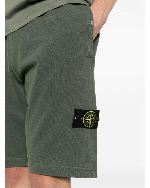 Pantaloni sportivi con applicazione Compass di Stone Island in Green da Uomo