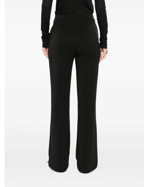 Woc Black Pressed-Crease Flared Trousers