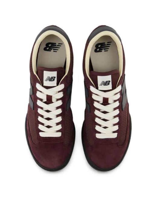 New Balance White Gator Run Sneakers