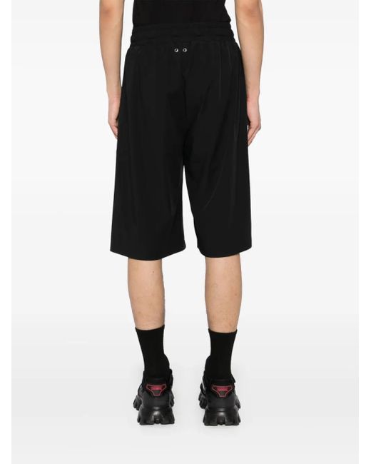Pantalones cortos de chándal The Original 1 TEAM WANG design de color Black