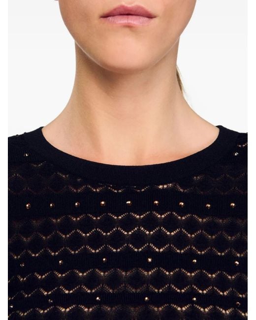 Vestido largo con apliques de strass Sandro de color Black