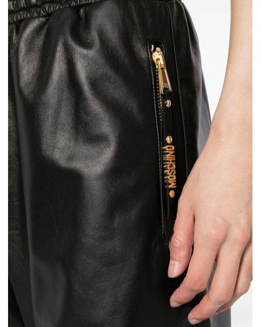 Moschino Black Cropped Leather Track Pants for men