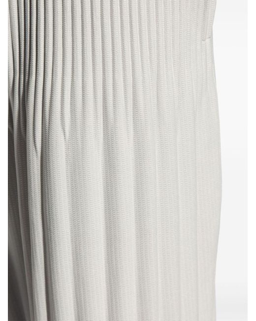 Homme Plissé Issey Miyake White Plissé Tapered Trousers for men