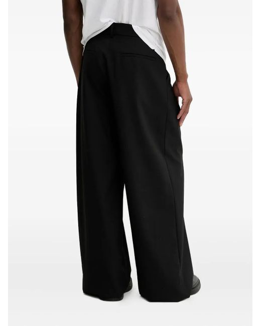 Nanushka Black Pleated Wide-Leg Trousers for men