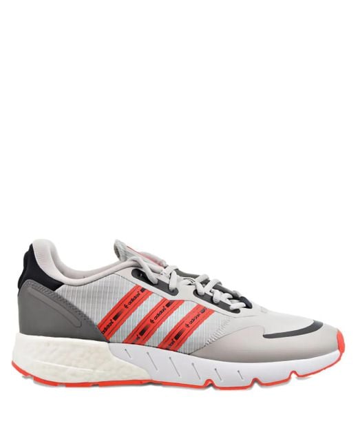 Sneakers Zx 1K Boost Semi/Solar" di Adidas in Pink da Uomo