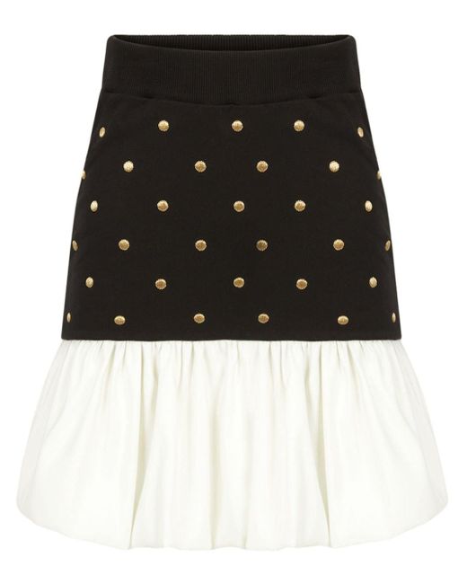 Falda con estampado de lunares Nina Ricci de color Black