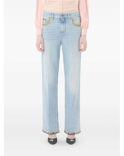 Valentino Garavani Blue Floral-Hem Faded Jeans