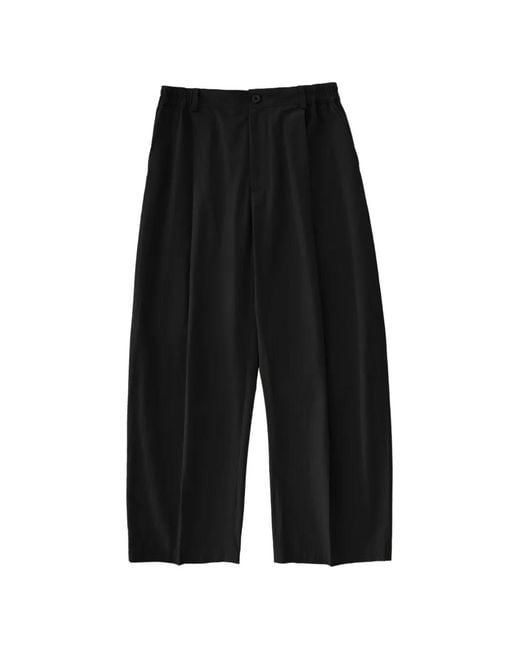 Studio Nicholson Black Shire Pleated Cotton Trousers for men