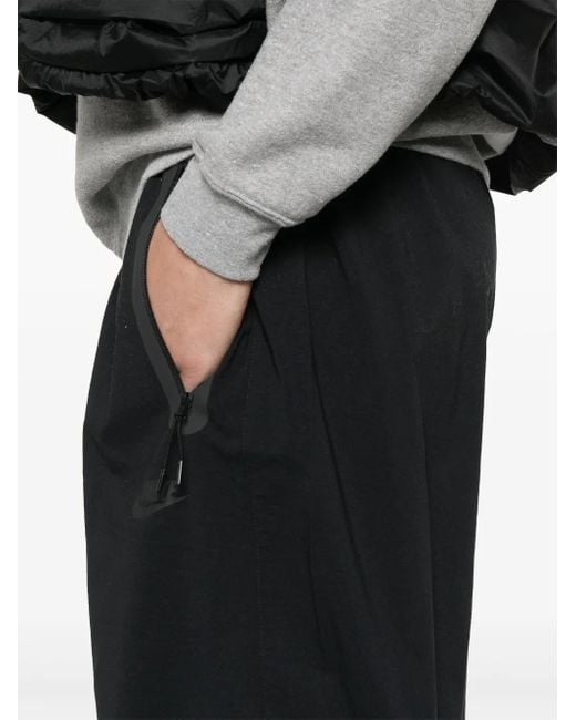 Pantalones Tech Nike de hombre de color Black