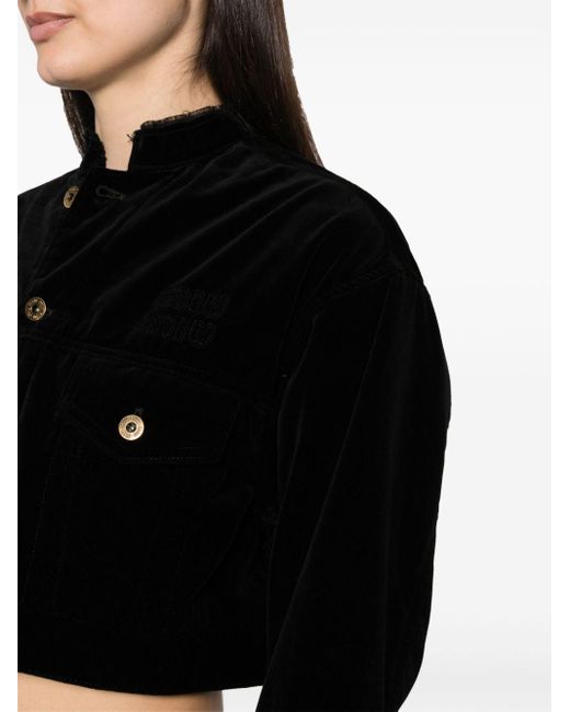 Veste en maille chenille à boutons embossés Miu Miu en coloris Black