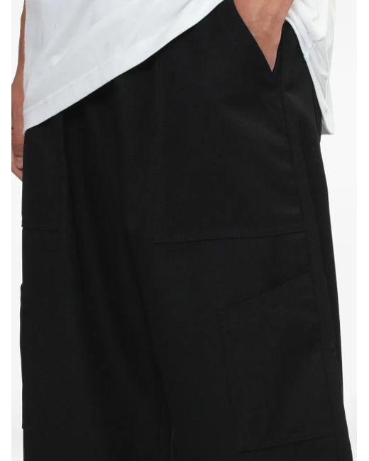 Pantaloni A Gamba Ampia di Comme des Garçons in Black da Uomo