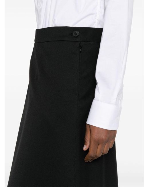 Jupe trapèze à coupe mi-longue Wardrobe NYC en coloris Black