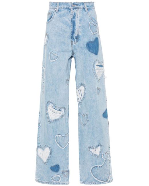 Jeans a gamba ampia con design patchwork di NAHMIAS in Blue da Uomo
