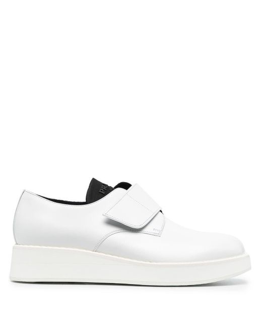 scarpe prada con strappo