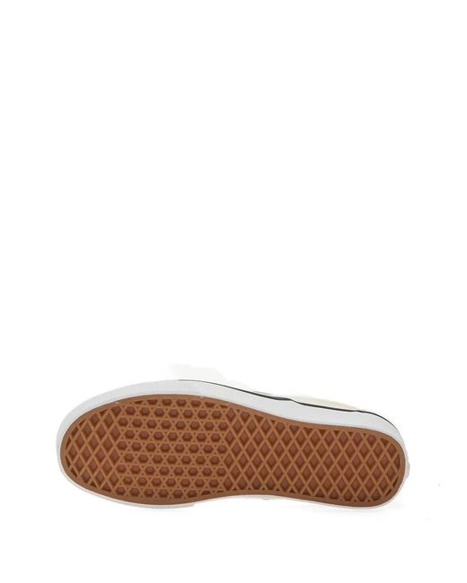 Vans White Canvas Slip-On Sneakers