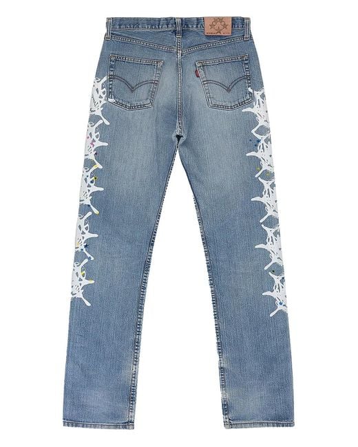 Sp5der Blue Web-Print Jeans for men
