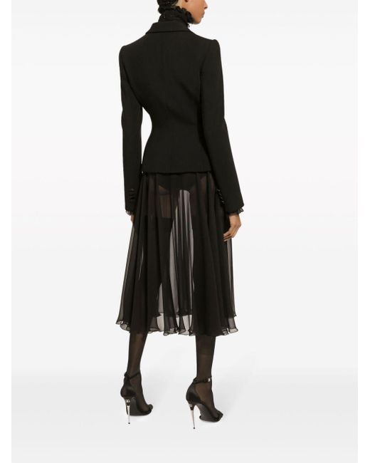 Jupe mi-longue à plis Dolce & Gabbana en coloris Black