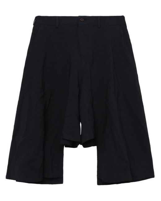Pantalones cortos asimétricos con efecto arrugado Comme des Garçons de hombre de color Blue