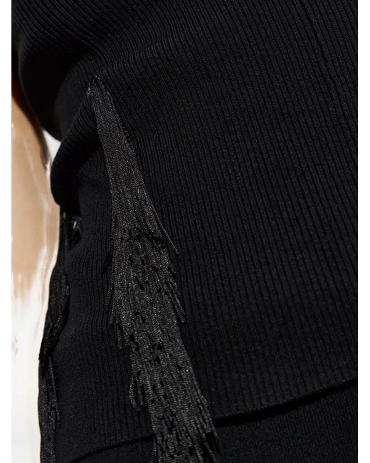 Top Flocon Con Flecos IRO de color Black
