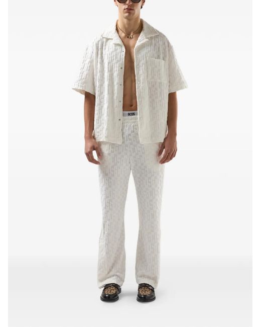 Gcds White Monogram-Pattern Trousers for men