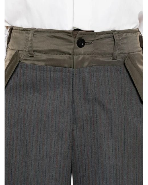 Pantalones a rayas diplomáticas Sacai de color Gray