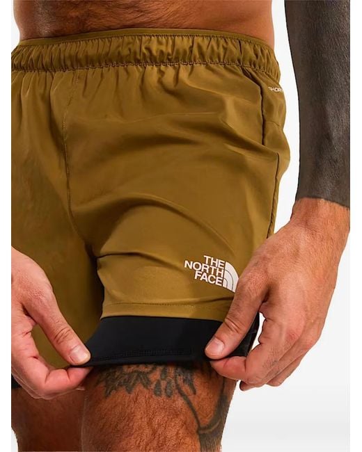 The North Face Yellow Logo Shorts for men