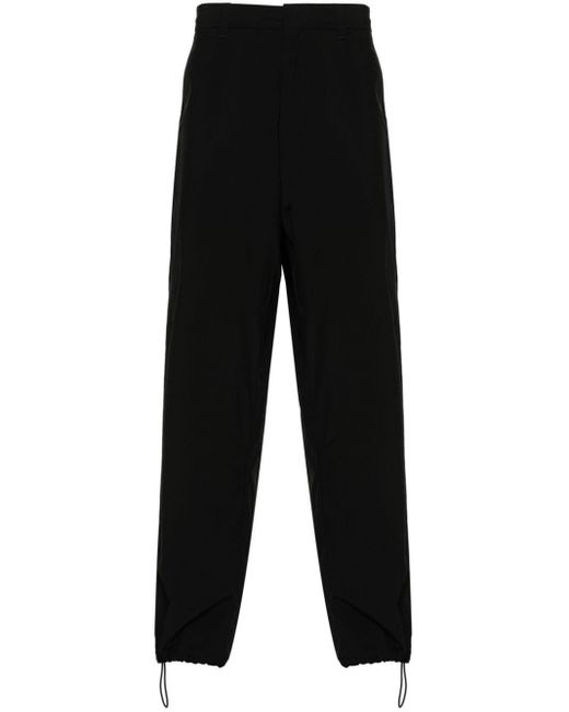 Pantaloni impermeabili di Prada in Black da Uomo