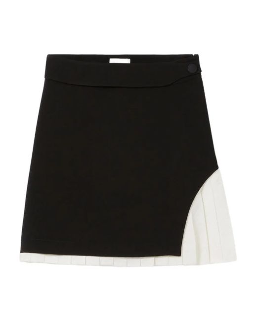 Jupe Courte À Empiècement Plissé Claudie Pierlot en coloris Black