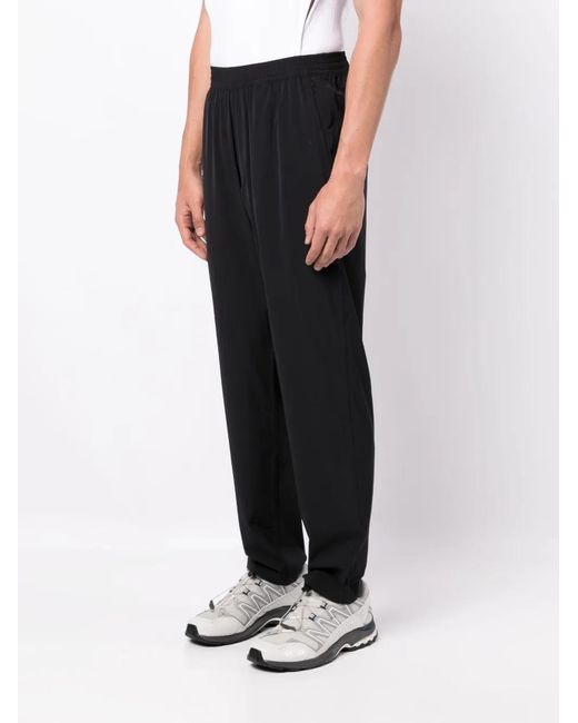 True Tribe Black Logo-Patch Elasticated-Waist Trousers for men